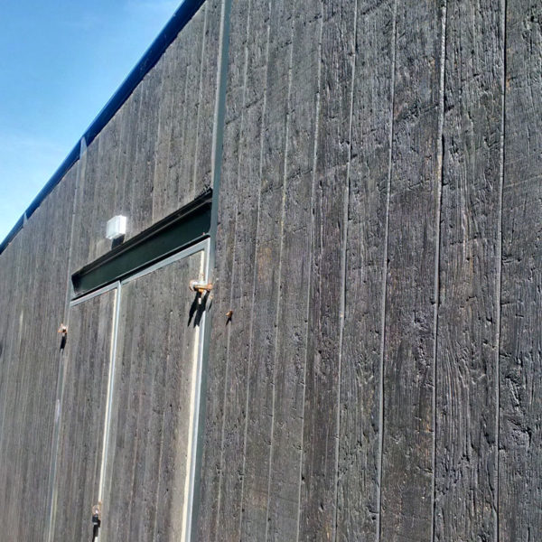 Millboard cladding in embered